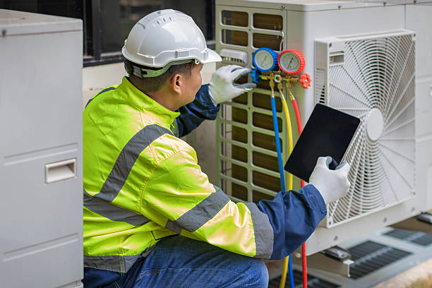 Professional Hvac technician working in Rehoboth, MA